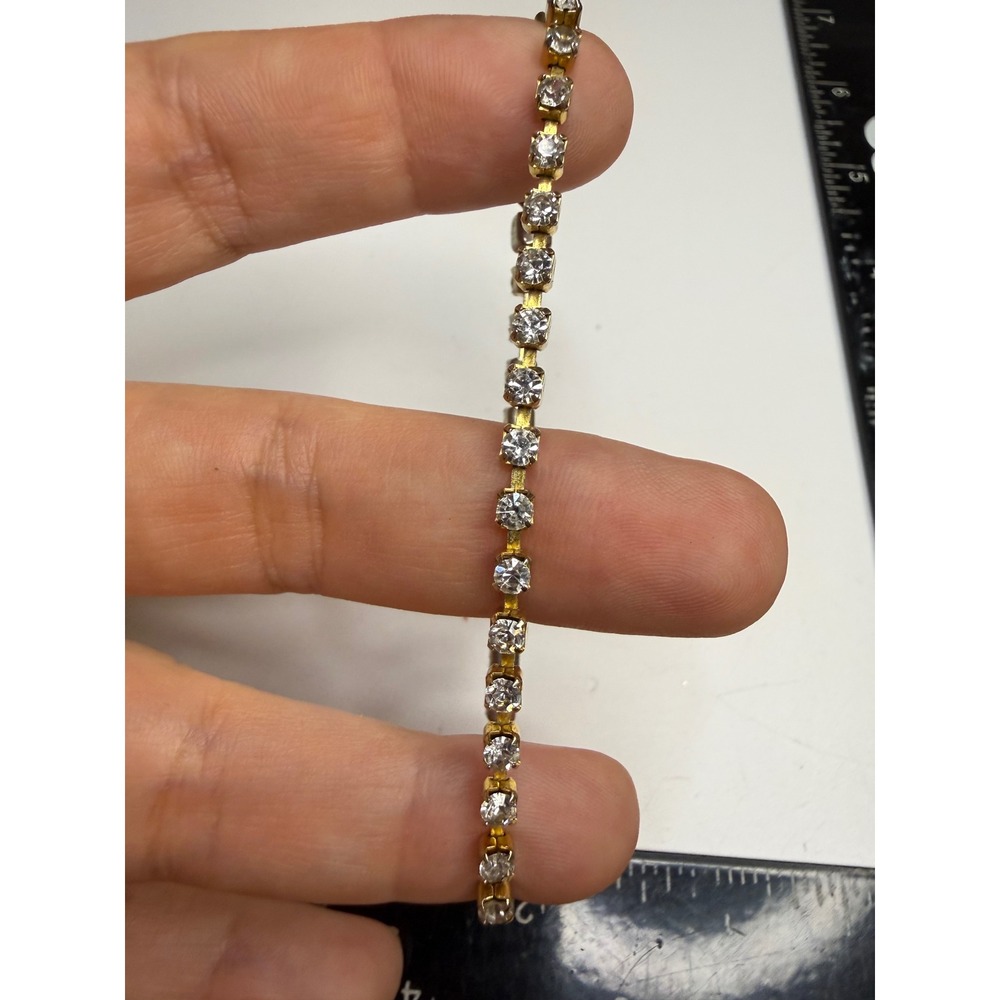 Vintage Gold Tone Clear Rhinestone Tennis Bracelet Fold Over Clasp 7 Inch